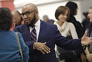 Anthony Lewis, a current assistant superintendent in the Kansas City, Mo. school district, and one of two finalists for the Lawrence school district's superintendent position, participates in a meet-and-greet in the Lawrence High School cafeteria Tuesday, Jan. 23, 2018.
