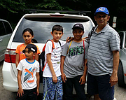 Syed Jamal, seen here with his daughter, two sons and his nephew during a family vacation in Tennessee, is facing deportation after more than 30 years in the United States. Jamal, a Lawrence research scientist and academic, has three American-born children, all of whom attend Lawrence schools: Taseen, 13, Naheen, 12, and Fareed, 6.