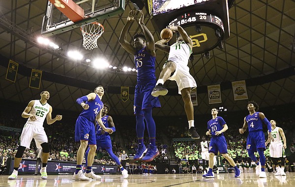 Baylor Bears forward Mark Vital (11) puts up a shot after drawing contact from Kansas center Udoka Azubuike (35) during the second half, Saturday, Feb. 11, 2018 at Ferrell Center in Waco, Texas.