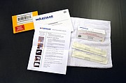 This test kit from Molecular Fitness includes instructions for swabbing your cheeks to collect DNA samples and envelopes in which to pack the samples to send them to the lab. The swabs come wrapped in sterile packages.