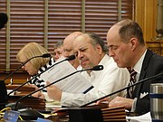 Rep. Steven Johnson, right, and Rep. Tom Sawyer, the chairman and ranking Democrat respectively on the House Taxation Committee, listen during testimony from groups opposed to raising the statewide property tax that helps fund public schools.