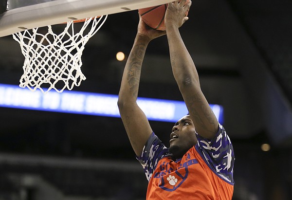 Clemson forward Elijah Thomas comes in for a dunk during practice on Thursday, March 22, 2018 at CenturyLink Center in Omaha, Neb.