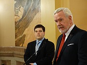 Former congressional candidate Matt Bevens, left, announces Wednesday that he is suspending his campaign in the 2nd District race and is endorsing fellow Republican Sen. Steve Fitzgerald.