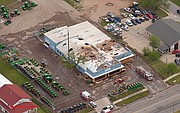 An aerial photo shows damage to Heritage Tractor, 1110 E. 23rd St., caused by a fire that occurred on Saturday, May 5, 2018.