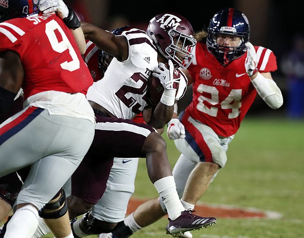 Kendall Bussey, shown in this Nov. 18, 2017 photo running for Texas A&M against Ole Miss, has transferred to Nicholls State and will play against Kansas at David Booth Memorial Stadium in Sept. 1 season opener. (AP Photo/Rogelio V. Solis)