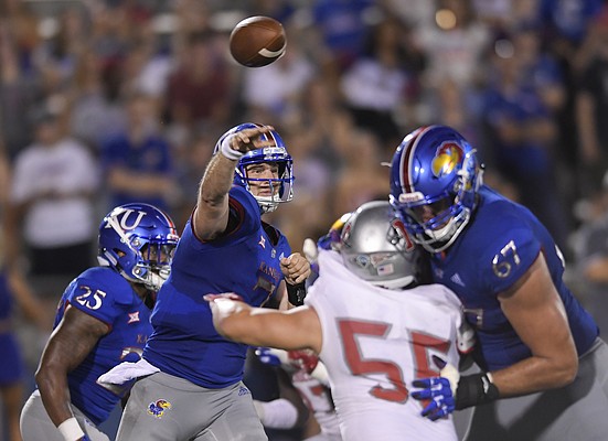 Quarterback Kansas Peyton Bender (7) faces Nicholls State in the second half of an NCAA college football match at Lawrence, Kan., On Saturday, September 1, 2018. (AP Photo / Reed Hoffmann