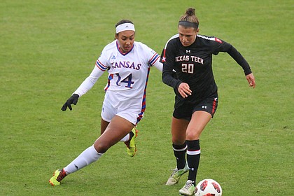 Freshman forward Samantha Barnett defends Red Raider midfielder Jayne Lydiatt. Kansas dropped a 2-1 decision to Texas Tech Sunday afternoon at Rock Chalk Park.