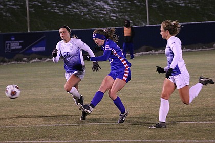 Grace Hagan takes a shot in the first half in the first half against Saint Louis. Kansas advanced to the second round of the NCAA Tournament with its 2-1 overtime win Friday at Rock Chalk Park.