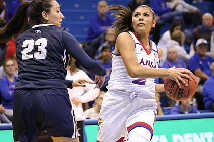 Senior guard Briana Osorio drives through the lane during KU's win over Oral Roberts in Allen Fieldhouse Tuesday Nov. 13, 2018.
