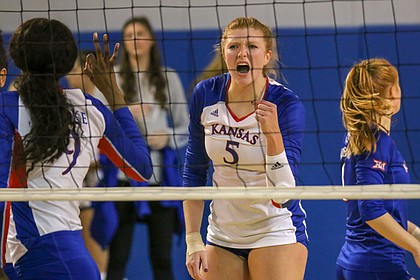 KU senior Gabby Simpson celebrates a point against Kansas State in a match Wednesday night at Horejsi Family Athletics Center.