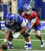 Open KU football practice provides hints of what depth chart ...