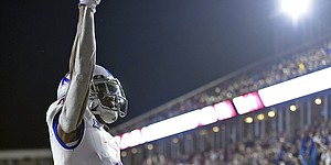 (Boston, MA, 9/13/19) Andrew Parchment (4), wide receiver of the DKansas Jayhawks, celebrates a touchdown against the Boston College Eagles during the first half of an NCAA football game at Boston College of Boston, Massachusetts on Friday, 13th, 2019.