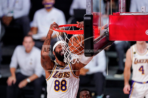 Los Angeles Lakers' Markieff Morris (88) dunks the ball against the Miami Heat during the first half in Game 3 of basketball's NBA Finals, Sunday, Oct. 4, 2020, in Lake Buena Vista, Fla. (AP Photo/Mark J. Terrill)

