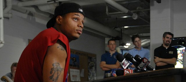 Nick Krug/Journal-World Photo.Kansas guard Brandon Rush takes questions during a press conference Thursday at Allen Fieldhouse in which Rush updated media members on the status of his injury.