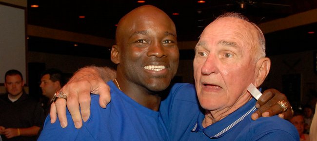 Former Kansas University linebacker Willie Pless, left, meets with former KU coach Don Fambrough in this 2007 file photo. Fambrough died on Saturday, Sept. 3, 2011 at the age of 88.