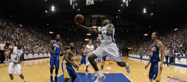 Kansas University's Russell Robinson puts in a reverse layup against UMKC. Robinson had 15 points and nine assists in the Jayhawks' 85-62 victory Sunday in Allen Fieldhouse.