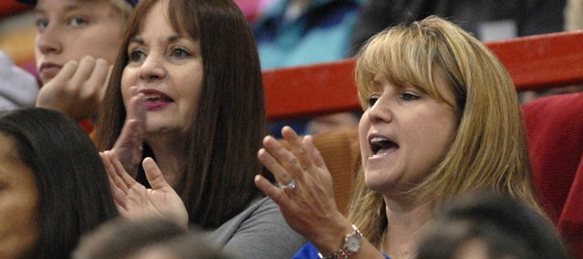 Cindy Self, right, cheers from the stands as Kansas defeats Eastern Washington during the Dec. 5 game at Allen Fieldhouse. Cindy's husband, Bill Self, is head coach for the KU men's basketball team. Cindy Self talks with the Journal-World about life in Lawrence and her role within the community.