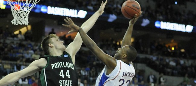KU's Darnell Jackson, right, puts up a shot in the lane against Portland State's Scott Morrison.