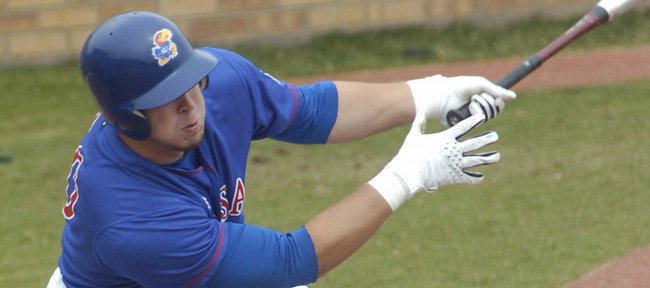 Junior Preston Land takes a stab at a pitch. Land drove in two runs in KU's 10-8 loss to Texas A&M on Sunday at Hoglund Ballpark.