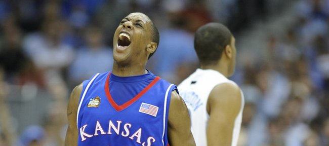 Kansas' Mario Chalmers screams with jubilation after draining a three against North Carolina in the first half of the 2008 Final Four game.