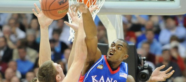 Kansas forward Darrell Arthur rejects a shot by North Carolina forward Tyler Hansbrough in the first half of the Jayhawks' Final Four victory over the Tar Heels in April at the Alamodome in San Antonio.