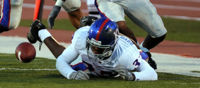 Kansas running back Carmon Boyd-Anderson scrambles after his fumble in the 2008 spring game. Boyd-Anderson notified Jayhawks coach Mark Mangino of his plans to leave KU and is now waiting to hear from the university whether he'll be released from his scholarship.