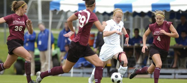 Kansas freshman Shannon McCabe, second from right, presses into Loyola-Chicago territory. The Jayhawks fell, 2-1, Sunday at Jayhawk Soccer Complex.