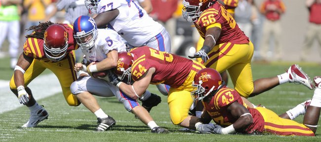 Kansas quarterback Todd Reesing is dragged down by the Iowa State defense late in the second quarter Saturday, Oct. 4, 2008 at Jack Trice Stadium in Ames.