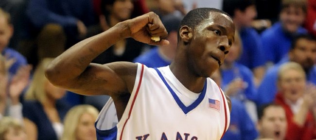Kansas guard Tyshawn Taylor pumps his fist after a bucket against New Mexico State during the second half Wednesday, Dec. 3, 2008 at Allen Fieldhouse.
