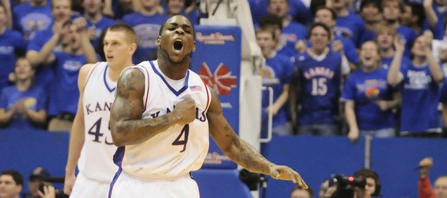 Kansas guard Sherron Collins thumps his chest after a fast break bucket against Tennessee during the first half Saturday, Jan. 3, 2009 at Allen Fieldhouse.