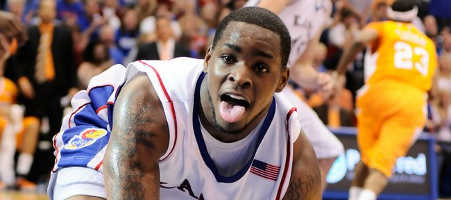Kansas guard Sherron Collins hangs his tongue out at the photographers after delivering a fast-break bucket against Tennessee during the first half Saturday, Jan. 3, 2009 at Allen Fieldhouse.