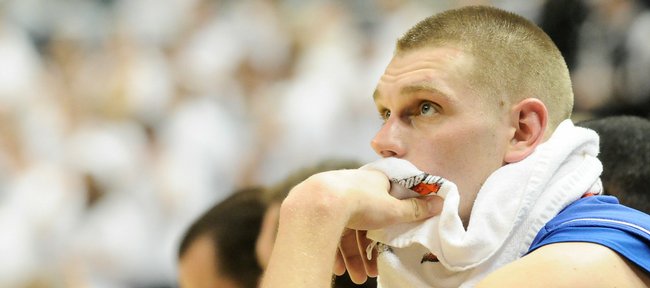 Kansas center Cole Aldrich watches from the bench with dismay as Michigan State increases their lead during the second half Saturday, Jan. 10, 2009 at the Breslin Center in East Lansing, Michigan.