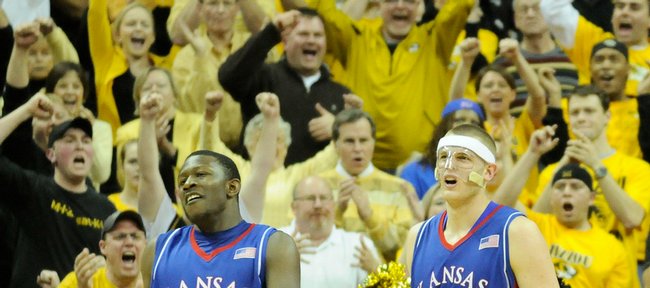 Kansas defenders Mario Little, left, and Cole Aldrich take a bit of harassment from the Missouri faithful during the second half Monday, Feb. 9, 2009 at Mizzou Arena.