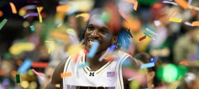 Missouri’s DeMarre Carroll (1) runs through the confetti after Missouri defeated Baylor in the Big 12 tournament championship game. The Tigers won, 73-60, Saturday in Oklahoma City to claim their first conference championship in 16 years.