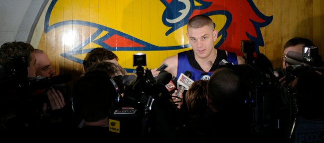 Kansas sophomore center Cole Aldrich is interviewed during a news conference on March 24 outside the locker rooms at Allen Fieldhouse. 