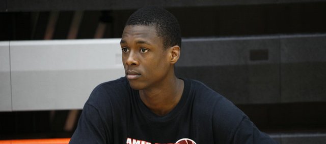 Ames High School basketball player Harrison Barnes looks on during practice at the school in Ames, Iowa. The 6-foot-7 standout has been pegged by many as the top prospect in the country.