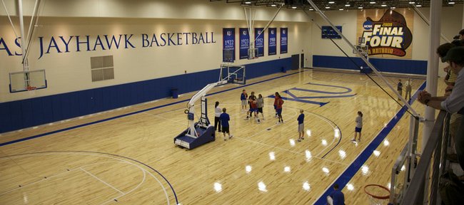 A few of the Kansas women’s basketball players work out in the new practice facility. The building was opened for a media tour on Wednesday.