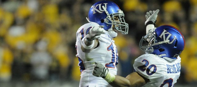 Kansas University defenders Chris Harris and D.J. Beshears (20) celebrate a fumble recovery against Colorado on Oct. 17, 2009, in Boulder, Colo. Harris, a senior cornerback, is hoping to use his experience, 	dependability and passion to create a memorable final year on the football field in 2010.