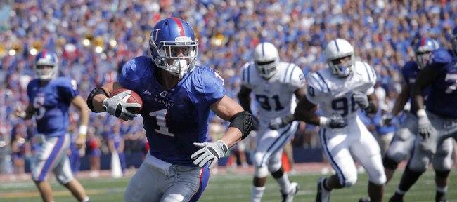 Kansas running back Jake Sharp seeks the end zone after making a catch in a September 2009 game against Duke. 