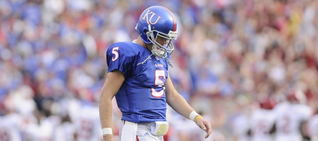 Todd Reesing hangs his head during the loss to Oklahoma on October 24, 2009. The Jayhawks look to bounce back against Texas Tech in Lubbock on Saturday.