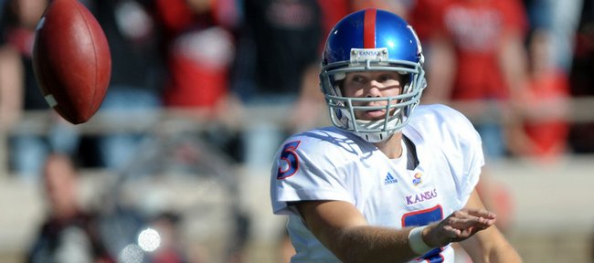 Kansas quarterback Todd Reesing pitches the football to Jake Sharp against Texas Tech at Jones AT&T Stadium in Lubbock, Texas, Saturday, Oct. 31, 2009.