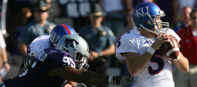 Kansas quarterback Todd Reesing was under pressure in the first half  of the Kansas and Kansas State game Saturday, Nov. 7, 2009 in Manhattan.