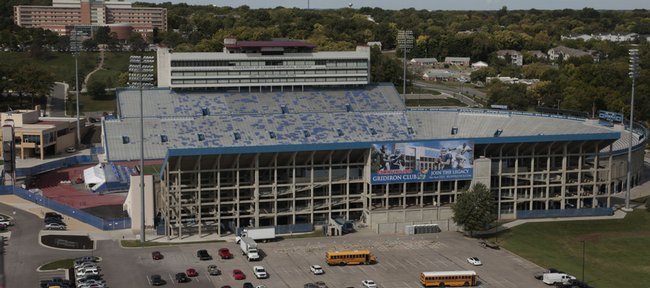 This view of Memorial Stadium, taken from the top floor of The Oread, shows the east side of Memorial Stadium in the foreground. KU’s season ticket seats for sporting events are organized on a points-based priority system based on donations, and a new “junior” fund allows students to contribute as well.