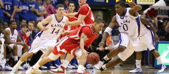 Kansas forward Thomas Robinson keeps pace with Radford guard Jeremy Robinson during the first half, Wednesday, Dec. 9, 2009 at Allen Fieldhouse.