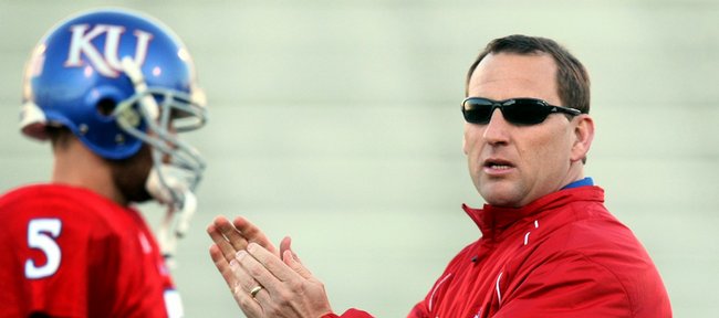 Former Kansas receivers coach David Beaty, right, will return to the KU coaching staff in 2011.