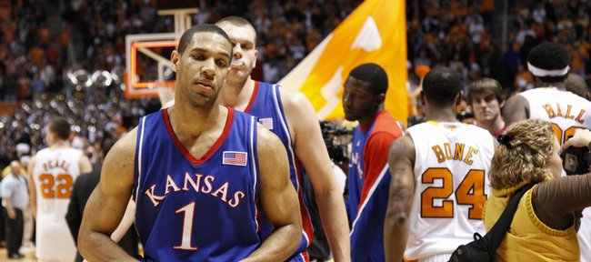 Dejected Kansas players Xavier Henry (1) and Cole Aldrich make their way from the floor after the Jayhawks' 76-68 loss to Tennessee Sunday, Jan. 10, 2009 at Thompson-Boling Arena in Knoxville.