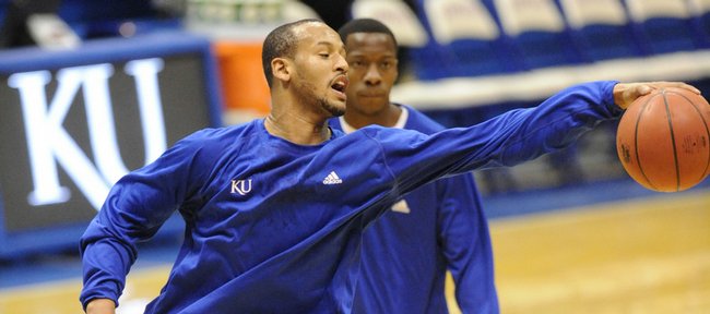 Kansas guard/forward Travis Releford snags a loose ball during warmups before the Jayhawks’ game against Baylor on Jan. 20 in Allen Fieldhouse. Releford, a sophomore from Kansas City, Mo., red-shirted last season.