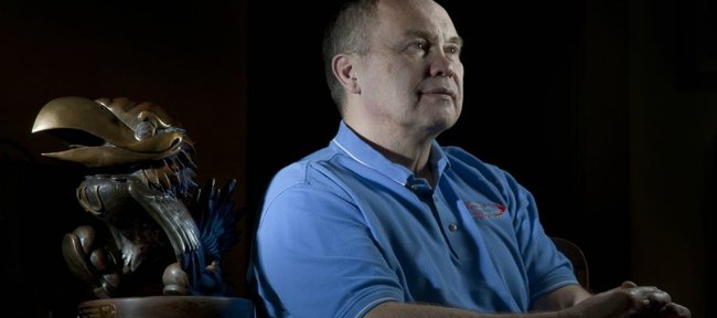 Dr. Ken Wertzberger, a Lawrence orthopedic surgeon, recalls working with Kansas University student athletes for 27 years during a 2010 interview. He was honored last year with the bronze Jayhawk statue by the KU Athletics Department. Recently, he decided to leave OrthoKansas after 32 years and start his own practice in Lawrence.