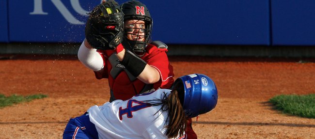 The Nebraska catcher shows the ball after blocking Kansas baserunner Sara Ramirez from the plate during the game Wednesday, April 14, 2010, at Arrocha Ballpark.  Ramirez was called out on the play. The Jayhawks lost 2-0 to the 'Huskers and fell to 1-8 in Big 12 Conference play.