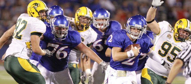 Kansas quarterback Jordan Webb takes off on a run against the North Dakota State defense during the fourth quarter, Saturday, Sept. 4, 2010 at Kivisto Field. The Jayhawks came up short in their season opener, dropping the contest 6-3.